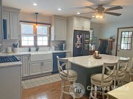 The gray cabinets work very well to camouflage these appliances. Charo Hunt Projects Cabinet World Of Pa