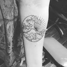 Get a glowing wave tattoo etched on your arm. My Great Wave Tattoo Geometric Tattoo Waves Tattoo Tattoos