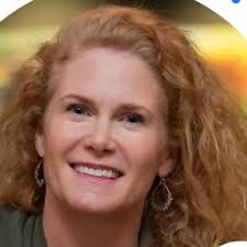 Epic Dorothy Hamill haircut.