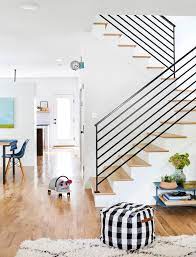 If you want to have a 'railing' that provides something to hold and help protect while using the stairs, and is removable for furniture movement, then i would suggest incorporating rope into the. 25 Stair Railing Ideas To Elevate Your Home S Style Better Homes Gardens