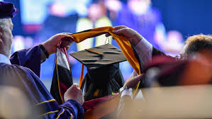 Faculty and graduates alike wear these graduation caps with dignity and pride of their accomplishments. Graduate Troy University