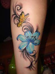 20lady: Tribal mit Blume und Schmetterling | Tattoos von Tattoo-Bewertung.de