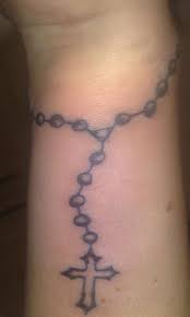Neo traditional wooden rosary beads tattoo. Rosary Tattoos Tattooimages Biz Inner Wrist Tattoos Tattoo Designs Wrist Chain Tattoo
