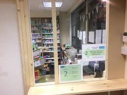 Coronavirus Hatch At Pharmacy In Bid To Stop Spread Of Virus York Press Kitchen through dining room serving hatch with open shelves over.