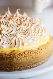 A Recipe And Video For The Perfect Lemon Meringue Cheesecake A Lemon Cookie Crust A Creamy Lemon Meringue Cheesecake Cheesecake Recipes Meringue Pie Recipes