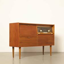 The cabinet is crafted of solid hardwood with a rich walnut brown finish. Lowboy F5x40a Cabinet By Philips 1960s 98085