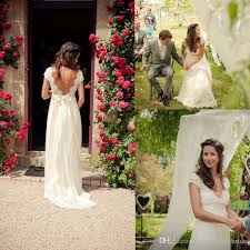 Blush roses and greenery tucked into the wedidng hair. Garden Wedding Dresses For Bride Off 63 Www Daralnahda Com