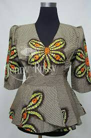 Faites Une Declaration Avec Cette Belle Partie D Un Genre Peplum Imprime Africain Haut Paire Avec African Print Tops African Print Peplum Top African Clothing