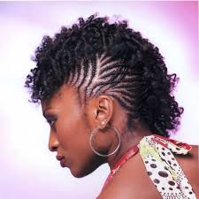 This woman proved that braids, bun and natural curls can all fit into a mohawk. See 50 Ways In Which You Can Rock Braided Mohawk Hairstyles Hair Motive