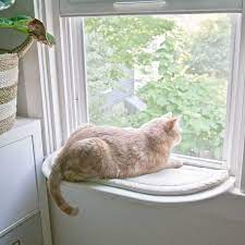 This diy cat window perch may make you feel impressive! Let S Get Catty Part 1 Copper Dot Interiors Diy Cat Perch Cat Window Perch Cat Window