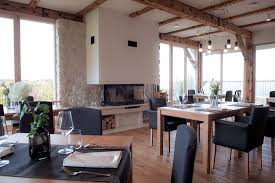 Although it has a lot of pops of burgundy, a color that transmits glamorous, the combination with white attenuates the ambiance keeping it simple while still looking sophisticated. Dining Room With Fireplace Perfect For Romantic Dinner Photo Dean Dubokovic Picture Of Hotel Tri Lucke Krsko Tripadvisor