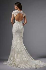 Slinky Wedding Dress With Cathedral Train Body Hugging Fit And Flare Gown Featuring Perfectly Pl Wtoo Wedding Dress Wedding Dresses Lace Fairy Wedding Dress