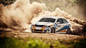Http Www Wallpapers4u Org Wp Content Uploads Opel Race Dust Trees Grass 27753 1920x1080 Jpg