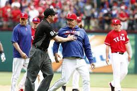 Third Base Umpire Lance Barrett 94 Restrains Texas Rangers Manager Jeff Banister 28 In The Eighth Inn Texas Rangers Texas Rangers Baseball Usa Today Sports
