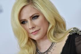Her blue eyes and white skin. What Is Lyme Disease Avril Lavigne On Her Tick Borne Illness