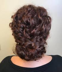 Braid the hair loosely and secure the ends with elastic. 20 Braids For Curly Hair That Will Change Your Look