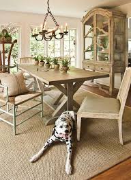 Traditional Dining Room Design With Hardwood Floors And Natural Fiber Rug Rustic Dining Room Rug Under Dining Table Dining Room Rug