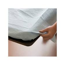 Women hold bed sheet with period blood spot stains on blur background. Disposable Bed Sheet Bed Sheets Manufacturer From New Delhi