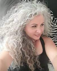 I Love That I Let My Hair Go Natural The Curl And The Grey Are All Me Long Grey Curly Hair Long Gray Hair Curly Hair Styles Naturally Silver White Hair