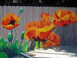 As with interior decorating, think of how using colour can help invigorate an outdoor space, especially a small garden. Painting A Concrete Wall Questions Fence Art Garden Mural Garden Fence Art