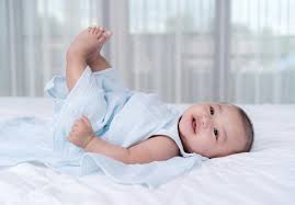 Why Do Babies Put Their Feet In The Air? It's More Than A Cute Quirk