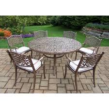 Tropitone banchetto slat aluminum 60''wide round kd dining table with umbrella hole 60''w x 60''d x 28''h. 7 Piece Aluminum Outdoor Dining Set With 60 In Round Table And 6 Cushioned Cast Aluminum Arm Chairs Hd2205t 2012c6 Om 13 Ab The Home Depot