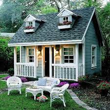 24 Adorable Playhouses You Need To See Shed Playhouse Backyard Playhouse Play Houses
