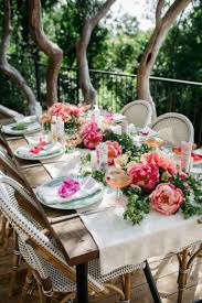 Turn an old wine crate into a blossoming centerpiece, with the help of hydrangeas and a collection of glass jars. 17 Picnic Table Settings To Inspire You Anns Liee