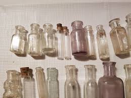 Some antique medicine bottles are embossed with the name and the city of the pharmacy or druggist it came from—these tend to be cylindrical, rectangular, square, or oval. Antique Medicine Bottles