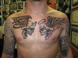 Perfect example of the duality of good and bad. Angel And Demon Skull With Wings Tattoo On Chest For Men