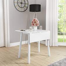 Although some tables are designed with a removable center leaf, drop leaf tables allow for one or both sides of the tables to be dropped, giving you plenty of options for your table. New Haven White Drop Leaf Space Saving Dining Table Furniture123