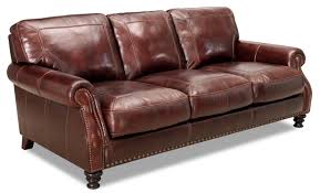 Add bright red throw pillows to a brown leather couch. Simon Li 6978 102 13758 1 Rolled Arm Leather Sofa With Nailhead Trim Furniture Fair North Carolina Sofa