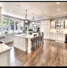 Cabinets extend from floor to ceiling, offering tons of closed storage space. 900 Kitchen Layout Ideas In 2021 Kitchen Design Kitchen Layout Kitchen Remodel