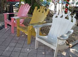 Here you may to know how to paint my adirondack chairs. Row Of Three Colorful Painted Adirondack Chairs Stock Photo Picture And Royalty Free Image Image 2670178