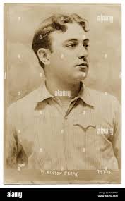 This sepia-tone photograph from 1909 shows the boulevard known as Lake  Shore Drive in Cleveland's Gordon Park. It features the roadway and a path  along Lake Erie, with a bathhouse visible in