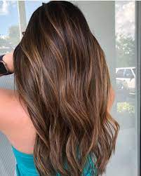 Strandlighting Is The Hottest Hair Color Trend Right Now And We Re Hoping This One Sticks Around Hair Color For Morena Hair Color Asian Hair Color For Morena Skin