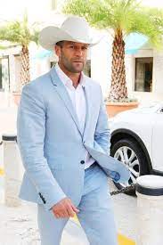 I Love Cowboys And Many People Including My Brothers Can Wear A Cowboy Hat And Look Good But Jason Statham Doe Wedding Suits Men Men Wedding Suit Wedding Suits
