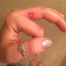 A symbol of the love the couple shares is worn on their wrists in the form of their heart tattoos. Tiny Pink Heart Heart Tattoo Body Art Tattoos