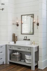 This bathroom by jennifer worts also features a beveled mirror for extra reflection and an acrylic stool for a touch of modern style. Home With Exposed Brick And Reclaimed Wood Interiors Home Bunch An Interior Des Bathroom Vanity Remodel Modern Farmhouse Bathroom Farmhouse Bathroom Vanity