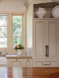 Apr 19, 2021 · above: Cream Kitchen Cabinets Stone Countertops Butcher Block Island Top Cream Trim Cream Kitchen Cabinets Antique White Kitchen Cream Colored Kitchen Cabinets