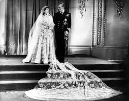 Princess elizabeth's dress was designed by royal couturier norman hartnell, who, according to harper's bazaar, was inspired by in 1947, the united kingdom was working to rebuild after the devastation of world war ii, and the country had strict. Inside The Making Of Queen Elizabeth S Wedding Dress Time