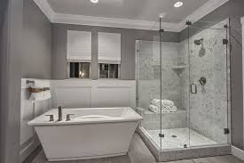 Free Standing Tub With Wainscoting Accentuate The Stone Surround Shower Walls In This Brilliant Owner S B Bathroom Shower Walls Bathroom Design Bathroom Layout