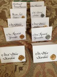 Place Cards With A Wax Seal Signifying Meal Selection For Each Guest Wedding Name Cards Wedding Place Cards Homemade Place Cards