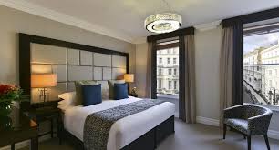They feature a living space with full kitchen and two bedrooms with queen beds. 2 Bedroom Luxury Serviced Apartments Kensington London