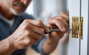 Hometown Locksmith technician working in Roy