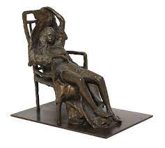 Marie Machen | figure of a slouching nude female on chair | MutualArt