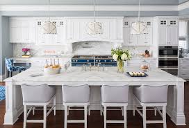Sleek white minimalist kitchen and a modern diner connected. Traditional Coastal Home With Classic White Kitchen Home Bunch Interior Design Ideas
