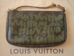 Originally a luggage maker, louis vuitton realized that flat trunks could be stacked, as opposed to the rounded trunks that were more popular at the time. Louis Vuitton Graffiti Pochette Accessoires Happyface313