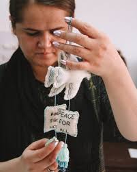 Our Peace For All decor in the product development and creation phase ✨  Handmade by Afghan refugee women in India, the final version of this  hanging carries the hopeful message: "Peace for