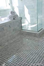 Black trim and crown molding set off a dark. Marble Basketweave Floor Transitional Bathroom Stay At Homeista
